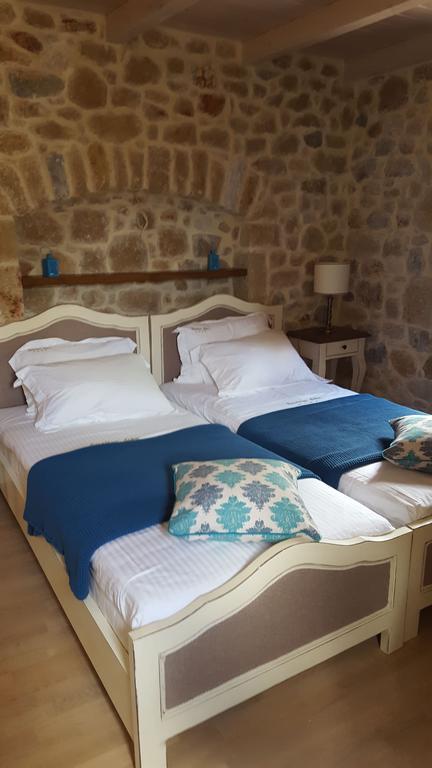 Vetilios Lithos Boutique Hotel Néon Oítilon Esterno foto